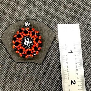 Flexible beaded belly ring/shield